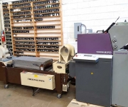 Two color Heidelberg offset press with the thermographer attachment.