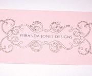 Business card.  Foil stamped dots and offset printed typography.