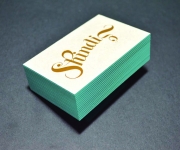 Business card.  Printed in gold foil, on 60 point gray chipboard.